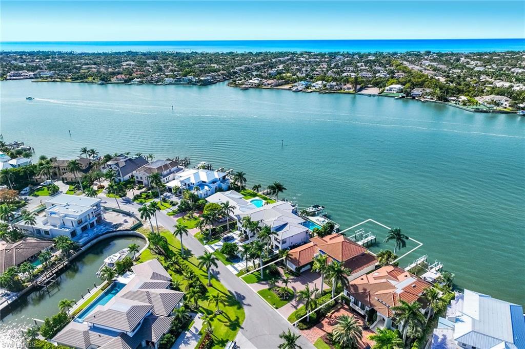 1942 Kingfish Road Naples, FL 34102 - Photo 10 of 50 a view of a city and ocean view