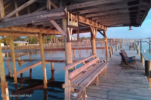 a view of chairs in the balcony