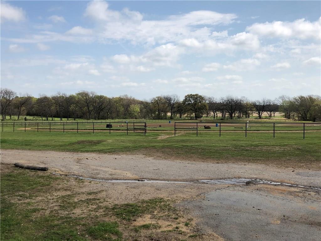 1019 Spring Hill Road Aubrey, TX 76227 - Photo 13 of 26 View of yard with a rural view and fence