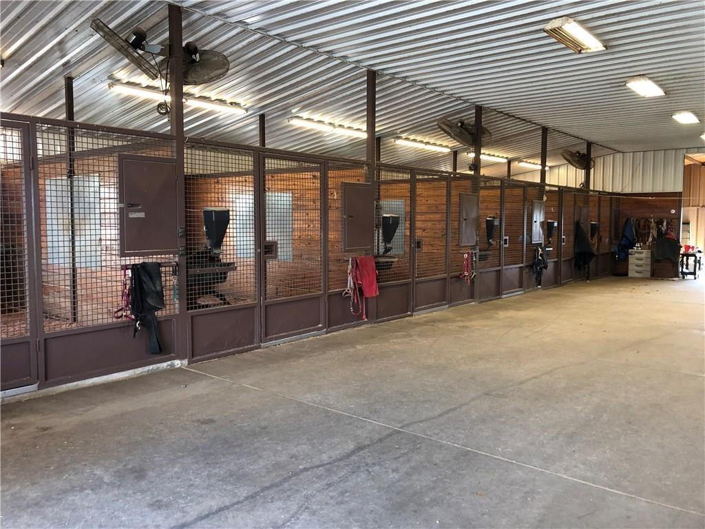 1019 Spring Hill Road Aubrey, TX 76227 - Photo 5 of 26 View of horse barn with electric panel