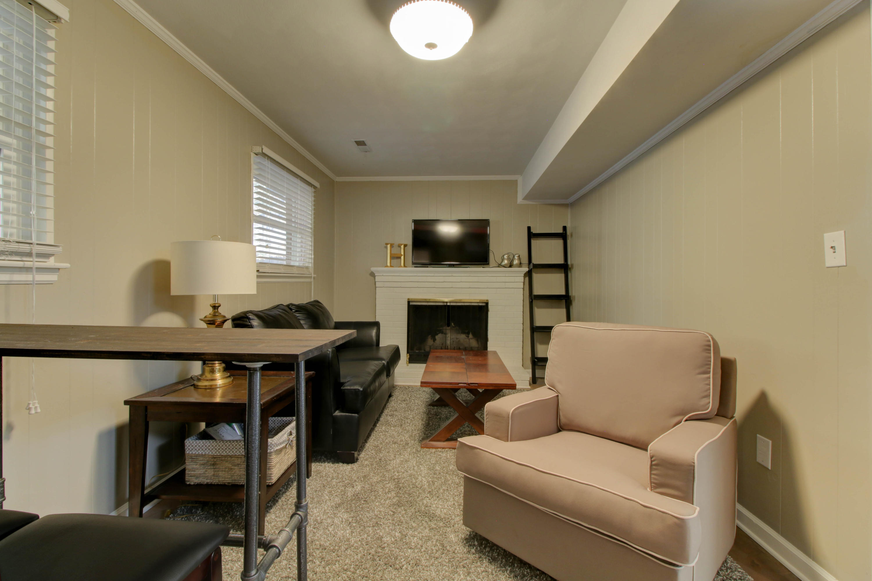 5954 Merriman Road Roanoke, VA 24018 - Photo 18 of 29 Basement Family Room with Fireplace