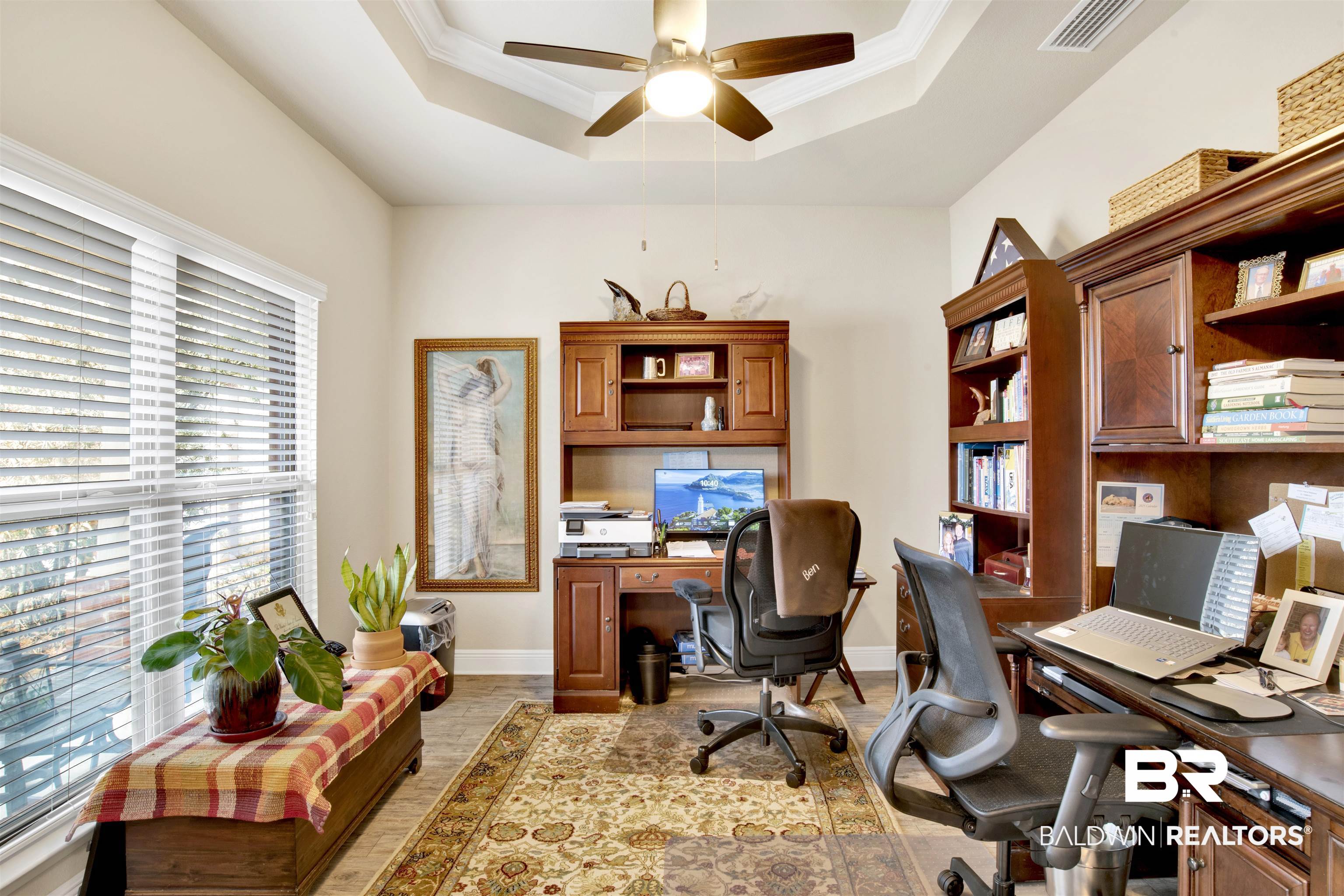 1476 Surrey Loop Foley, AL 36535 - Photo 6 of 31 Home office with a raised ceiling, ornamental molding, light wood-type flooring, and ceiling fan