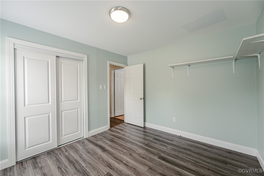 9286 Hungary Road Glen Allen, VA 23060 - Photo 18 of 50 Unfurnished bedroom featuring dark wood-type floor
