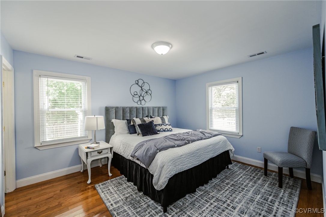 9286 Hungary Road Glen Allen, VA 23060 - Photo 19 of 50 Bedroom featuring multiple windows and wood finish