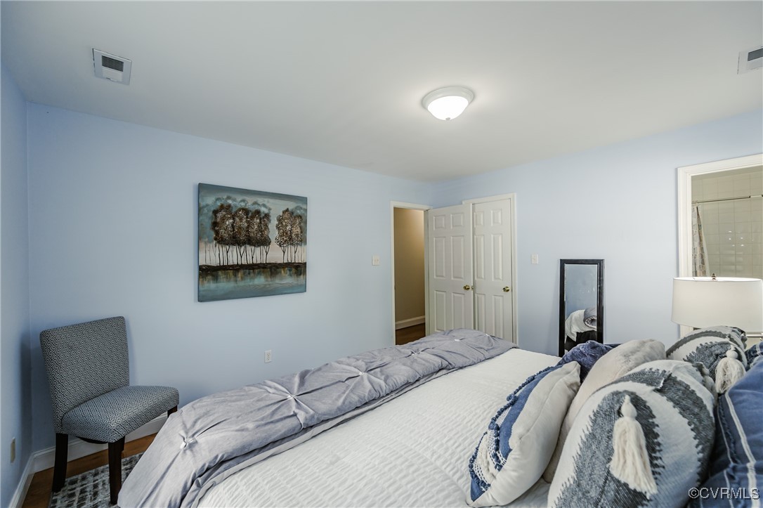 9286 Hungary Road Glen Allen, VA 23060 - Photo 20 of 50 Bedroom featuring wood finished floors and baseboa