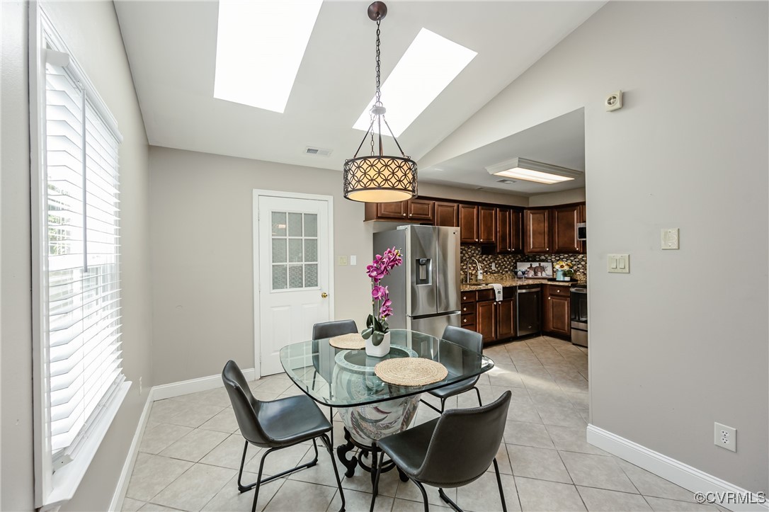 9286 Hungary Road Glen Allen, VA 23060 - Photo 25 of 50 Dining space with light tile patterned floors, vau