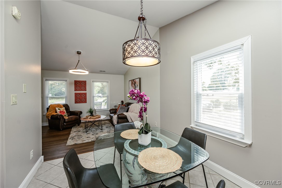 9286 Hungary Road Glen Allen, VA 23060 - Photo 27 of 50 Dining space with lofted ceiling and light tile pa