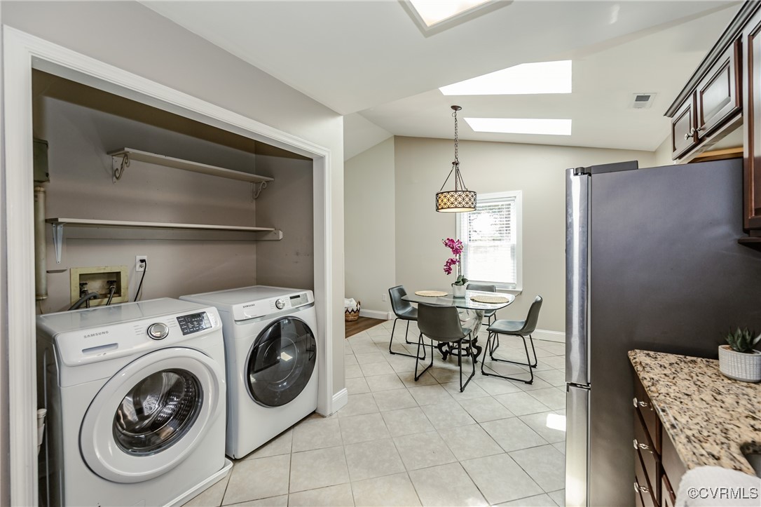 9286 Hungary Road Glen Allen, VA 23060 - Photo 32 of 50 Laundry area with a skylight, washer and clothes d