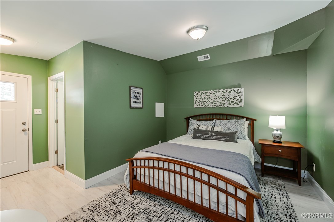 9286 Hungary Road Glen Allen, VA 23060 - Photo 36 of 50 Bedroom with light wood-style floors and baseboard