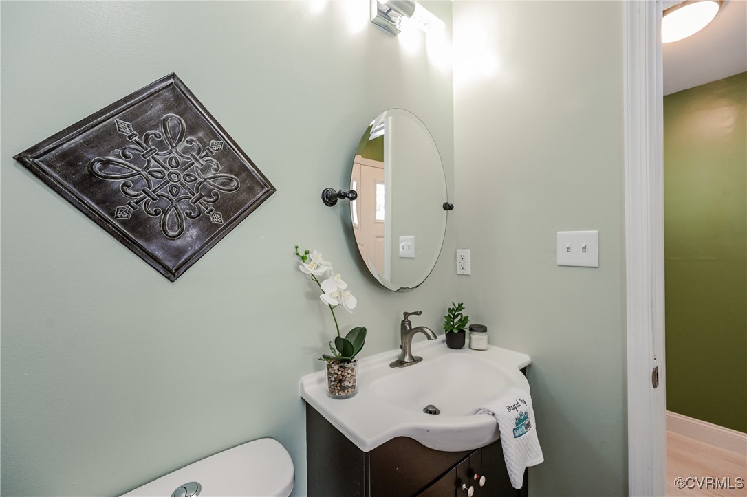 9286 Hungary Road Glen Allen, VA 23060 - Photo 38 of 50 Half bath with vanity and toilet