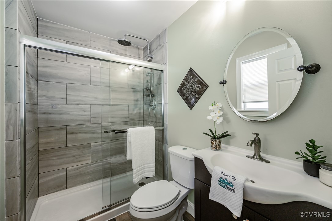 9286 Hungary Road Glen Allen, VA 23060 - Photo 39 of 50 Bathroom featuring vanity and a shower stall