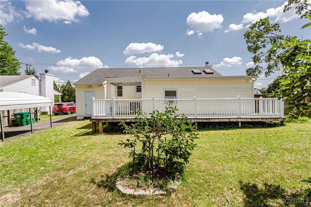 9286 Hungary Road Glen Allen, VA 23060 - Photo 46 of 50 Back of property featuring a wooden deck, a yard,
