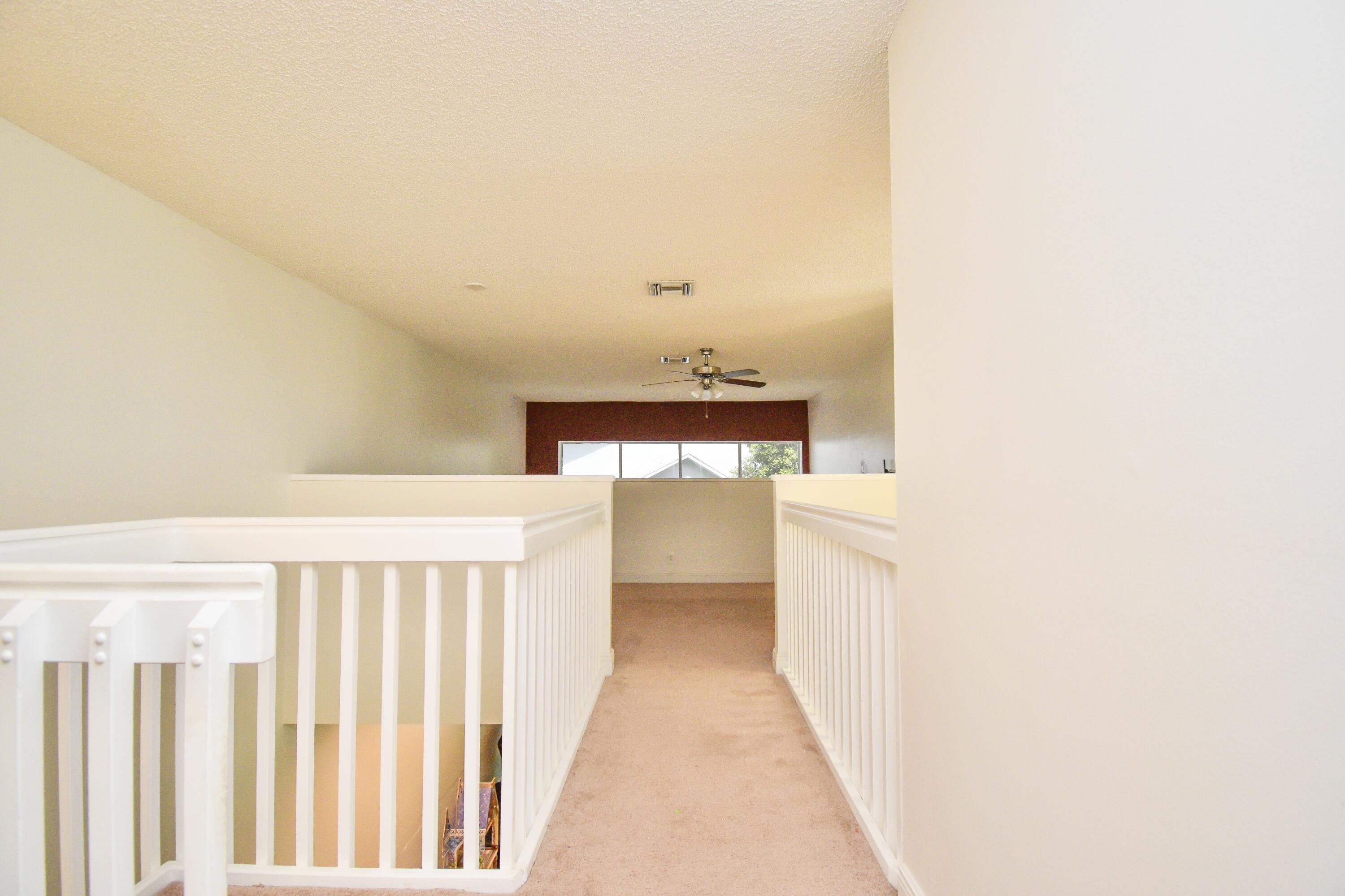 6053 Old Court Road, Unit 308 Boca Raton, FL 33433 - Photo 13 of 22 a entryway of a house with a hallway