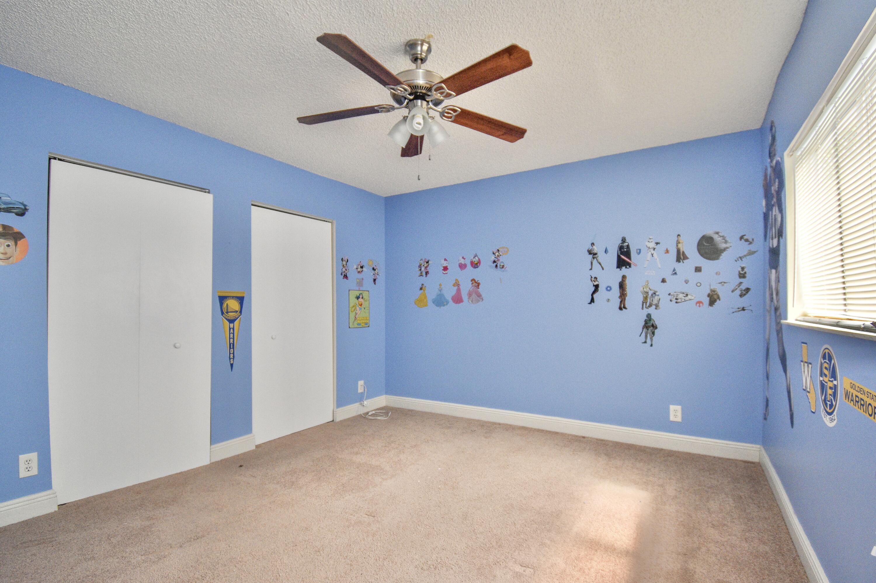 6053 Old Court Road, Unit 308 Boca Raton, FL 33433 - Photo 16 of 22 a view of an empty room with window and a ceiling fan