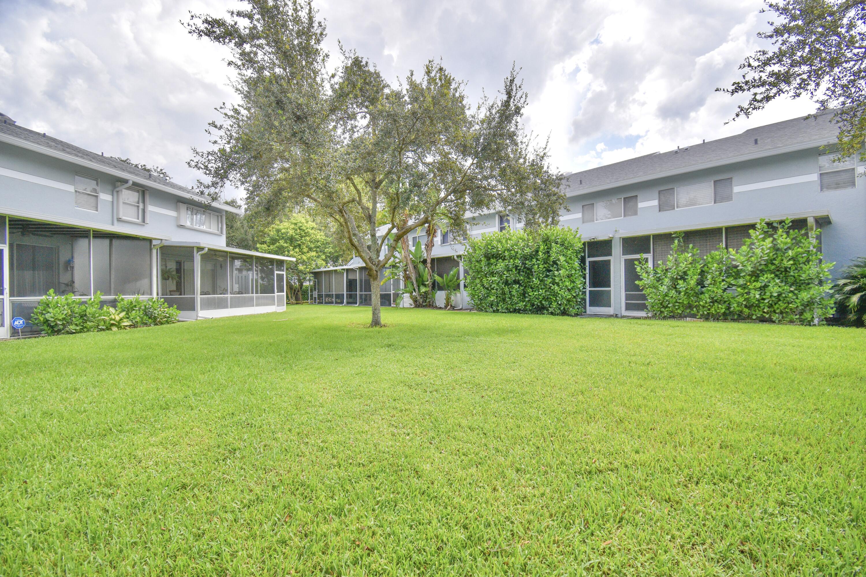 6053 Old Court Road, Unit 308 Boca Raton, FL 33433 - Photo 21 of 22 a view of a house with a yard