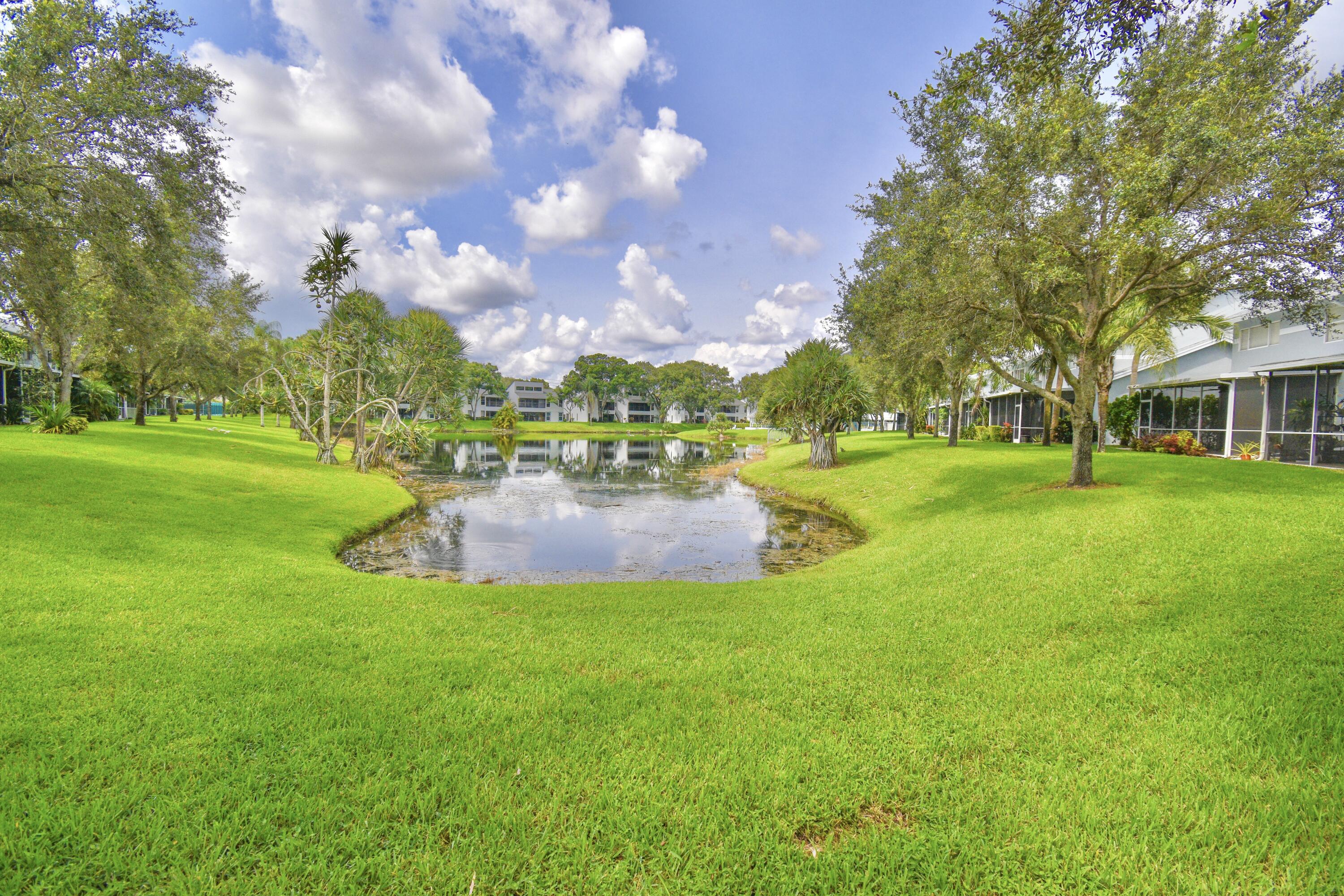 6053 Old Court Road, Unit 308 Boca Raton, FL 33433 - Photo 3 of 22 a view of a park with large trees