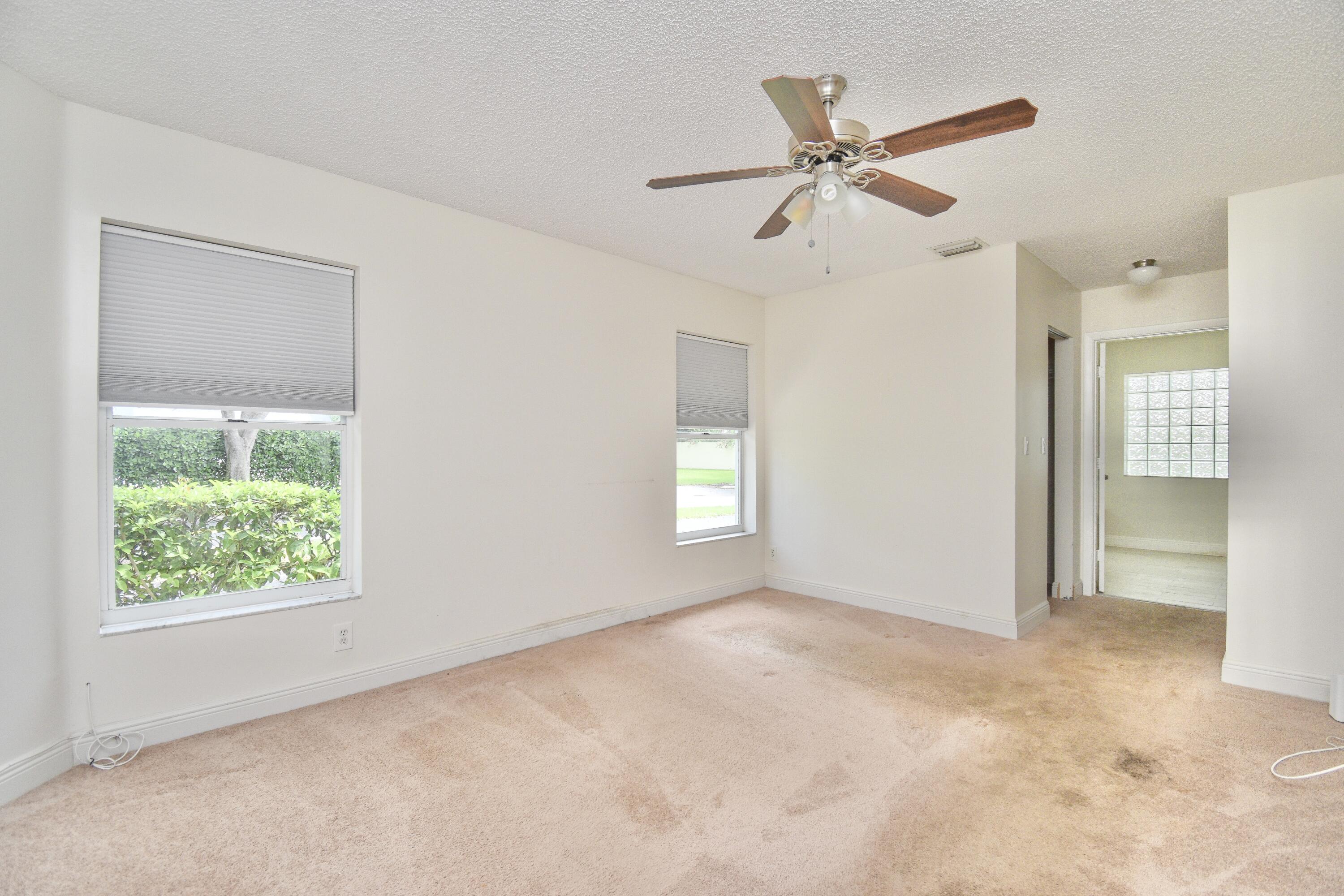 6053 Old Court Road, Unit 308 Boca Raton, FL 33433 - Photo 10 of 22 a view of an empty room with a window