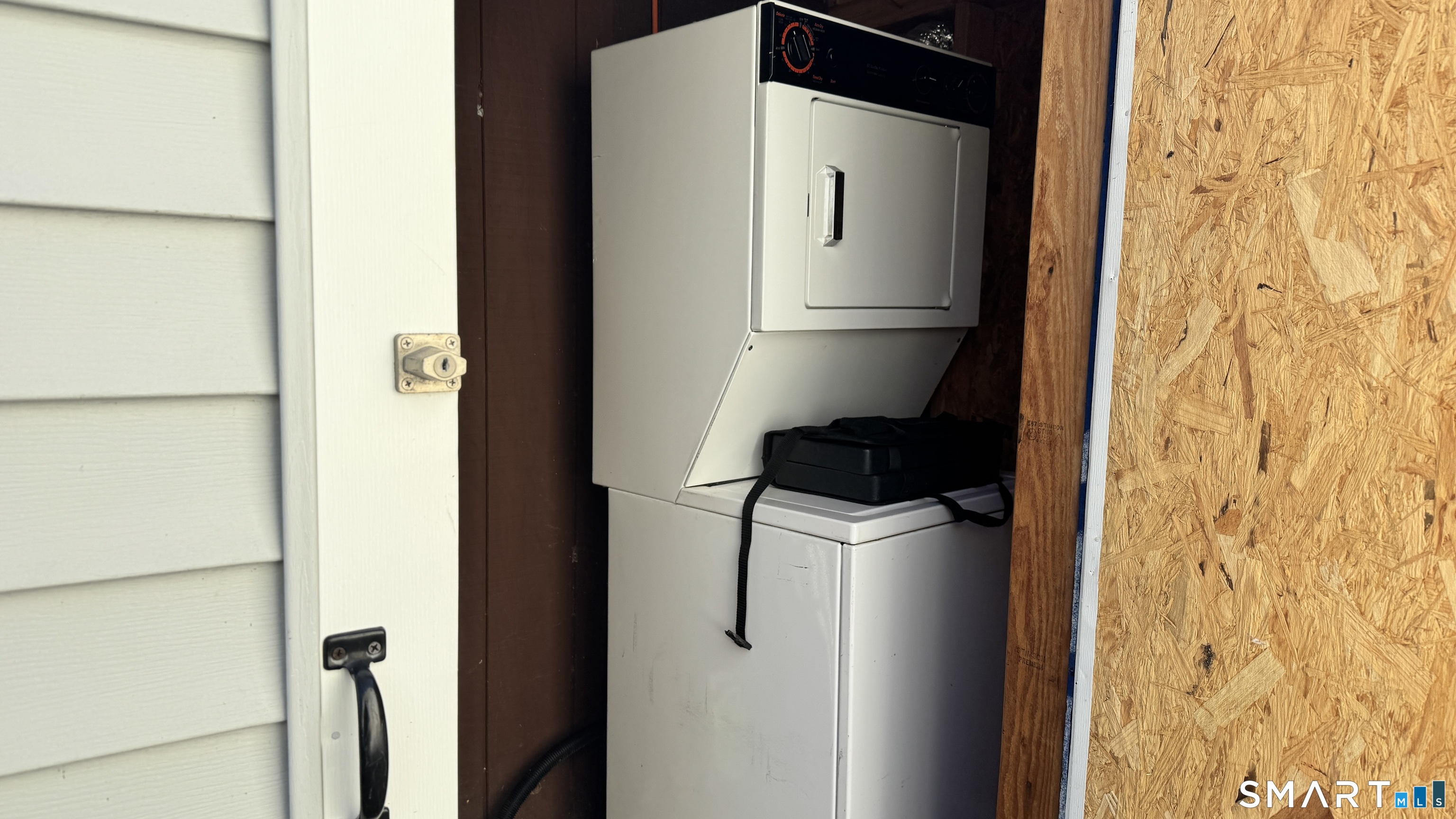 16 North Street Madison, CT 06443 - Photo 24 of 25 Shed with washer and dryer