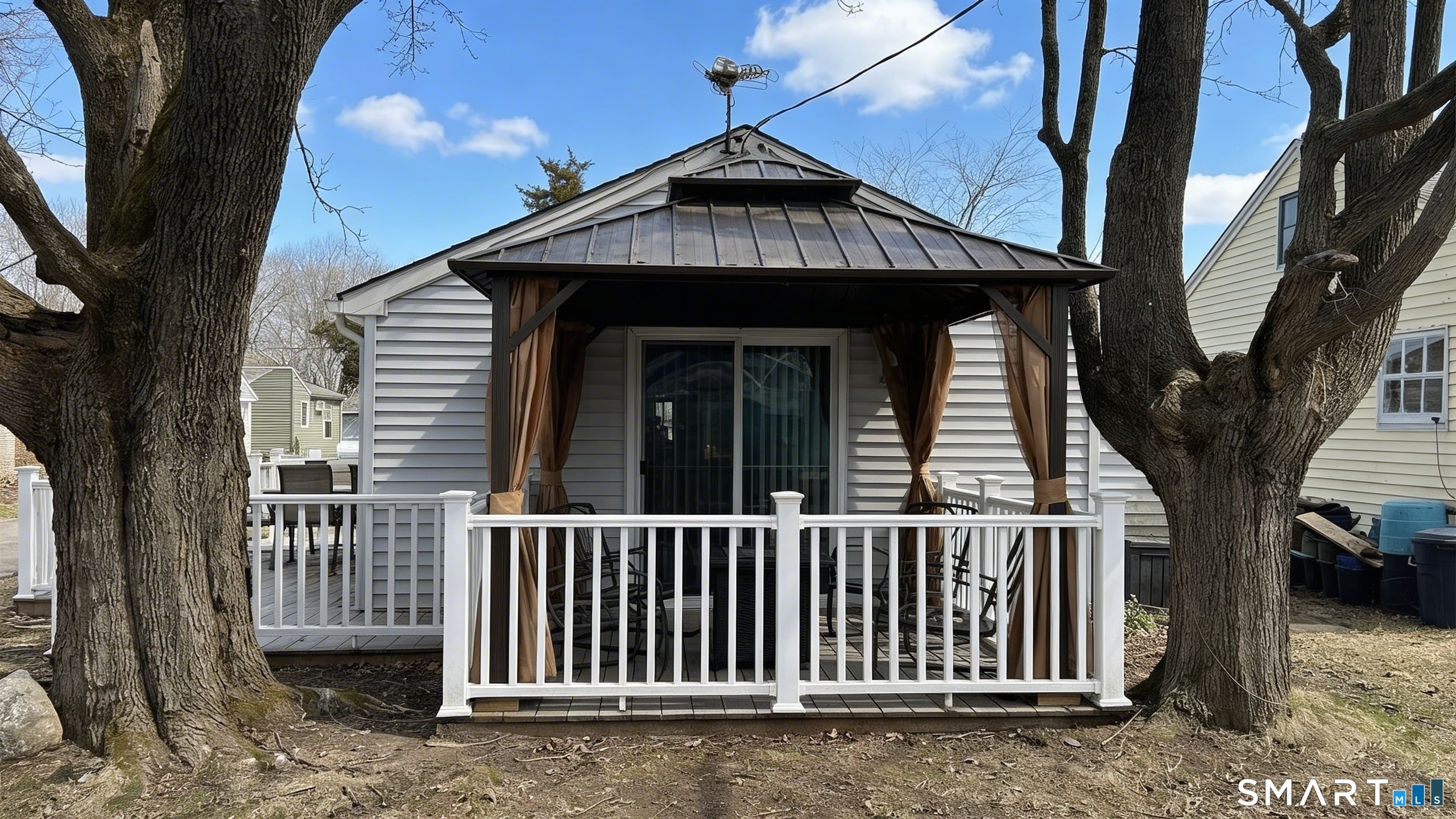 16 North Street Madison, CT 06443 - Photo 3 of 25 Pergola on side of deck
