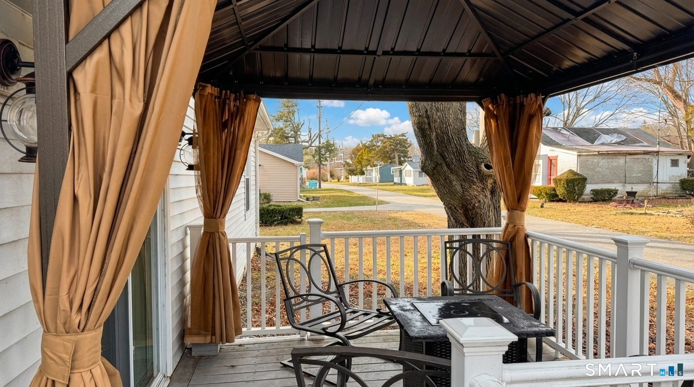 16 North Street Madison, CT 06443 - Photo 4 of 25 Outdoor seating around a firepit