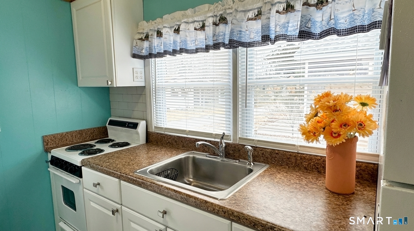 16 North Street Madison, CT 06443 - Photo 9 of 25 Lots of light from double window