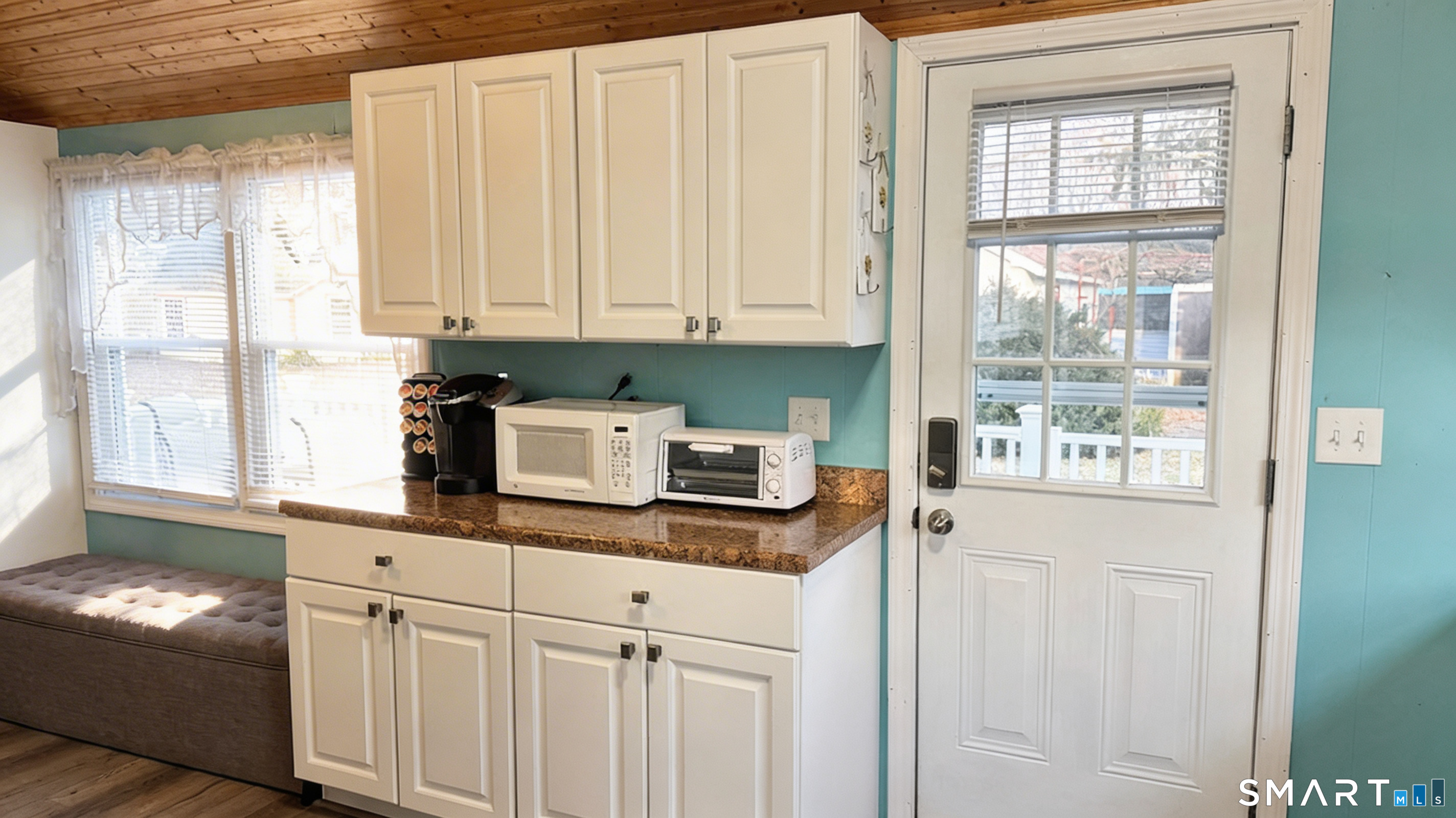 16 North Street Madison, CT 06443 - Photo 10 of 25 Side counter adds storage and workspace