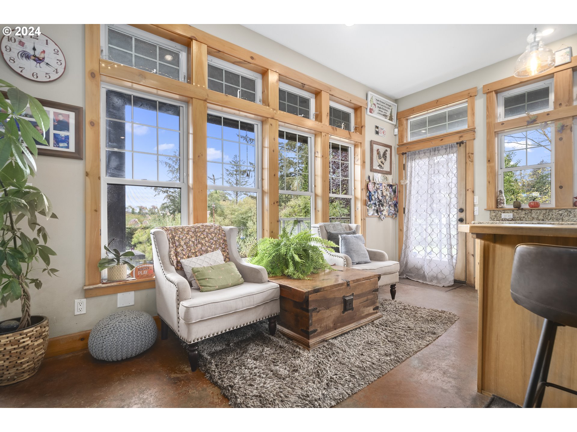 4701 Northeast Neotsu Drive Neotsu, OR 97364 - Photo 12 of 46 a living room with furniture and large windows