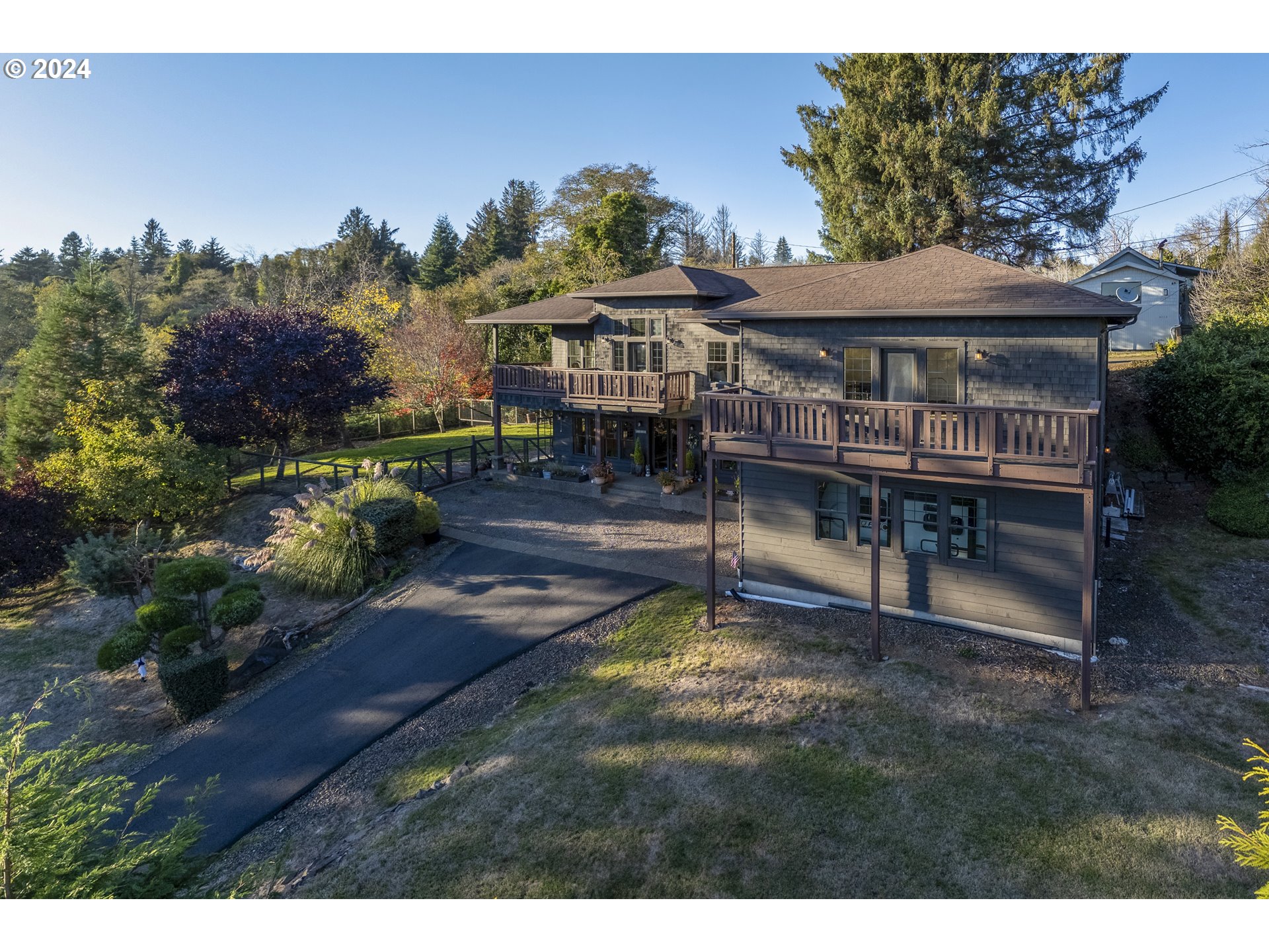 4701 Northeast Neotsu Drive Neotsu, OR 97364 - Photo 34 of 46 a view of a house with a patio