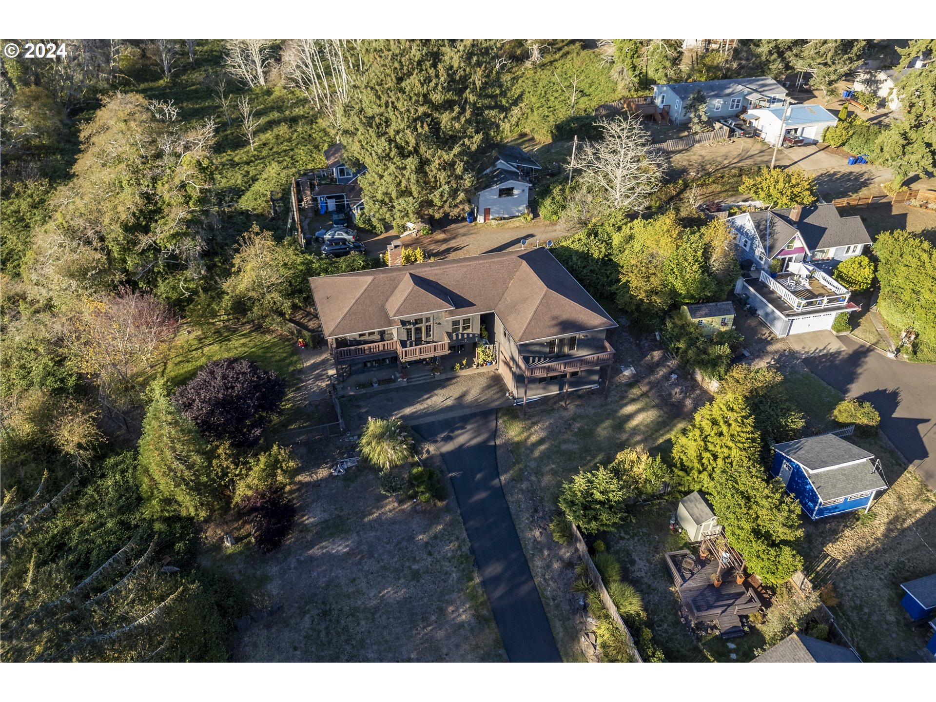 4701 Northeast Neotsu Drive Neotsu, OR 97364 - Photo 40 of 46 a view of a house with a yard