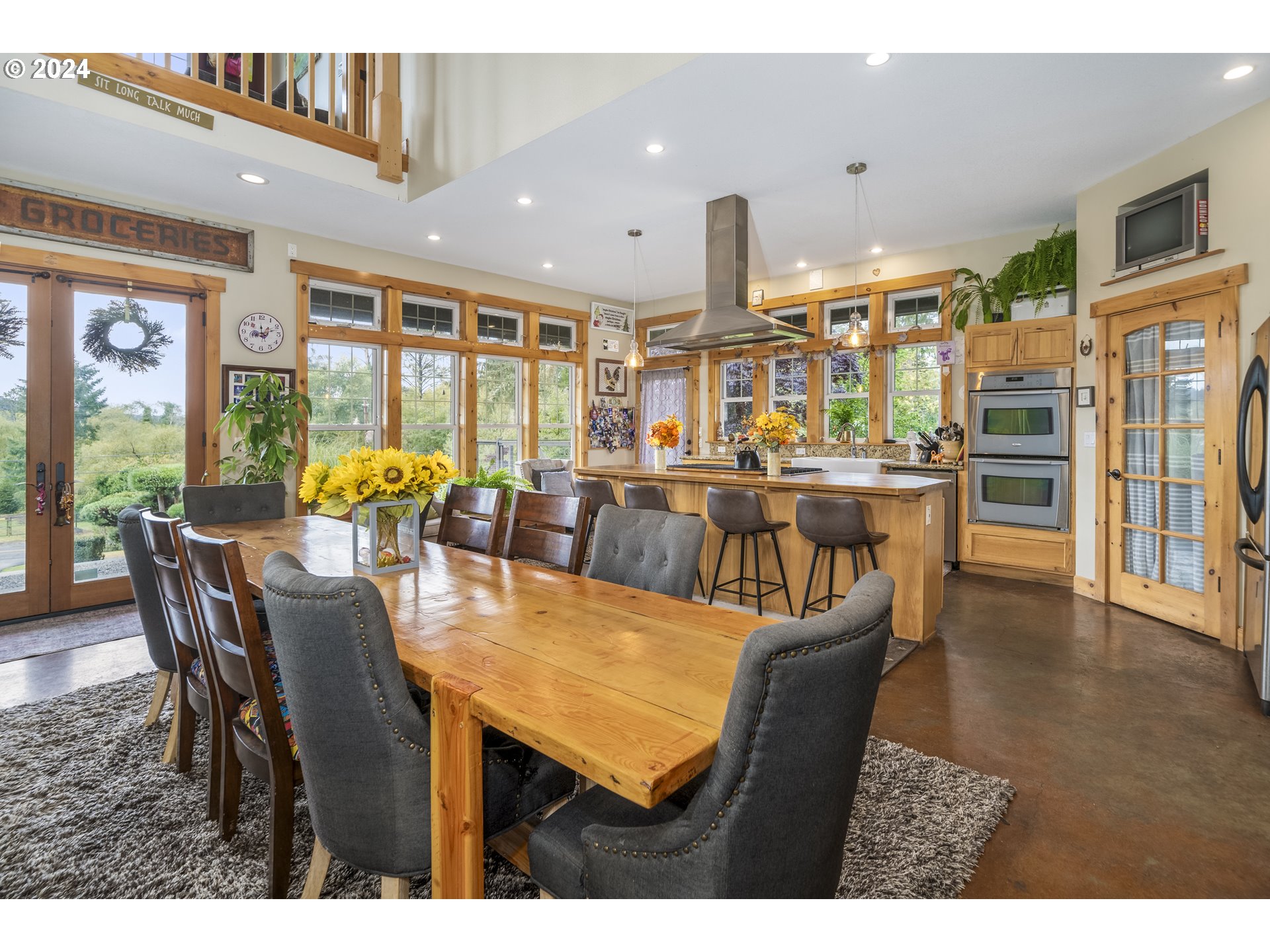 4701 Northeast Neotsu Drive Neotsu, OR 97364 - Photo 10 of 46 a dining room with furniture window and wooden floor