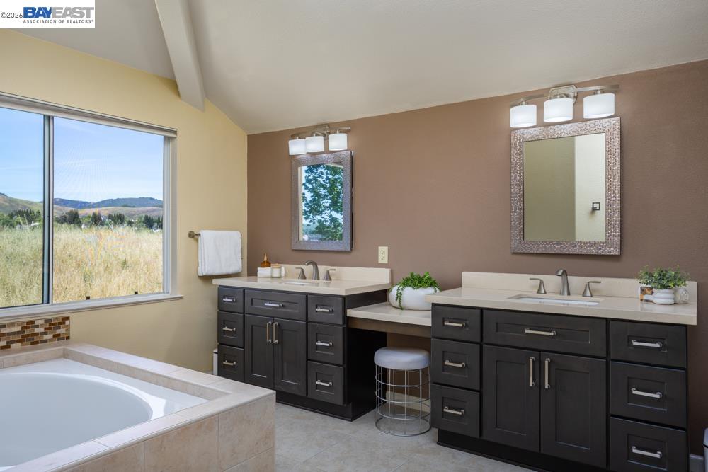302 Sunset Drive Danville, CA 94506 - Photo 18 of 31 a spacious bathroom with a tub sink and mirror