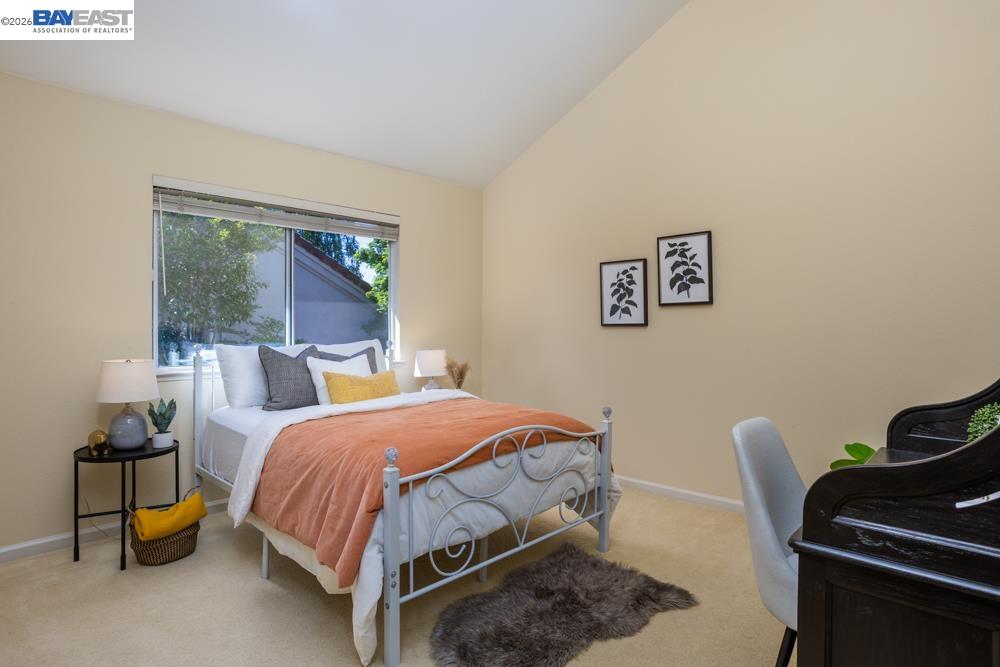 302 Sunset Drive Danville, CA 94506 - Photo 22 of 31 a bedroom with a bed and lamp