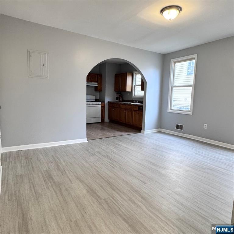 97 Clinton Place Newark, NJ 07108 - Photo 6 of 9 a view of a livingroom with wooden floor