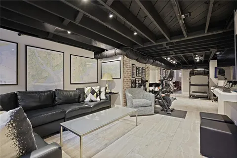 a living room with furniture and a window