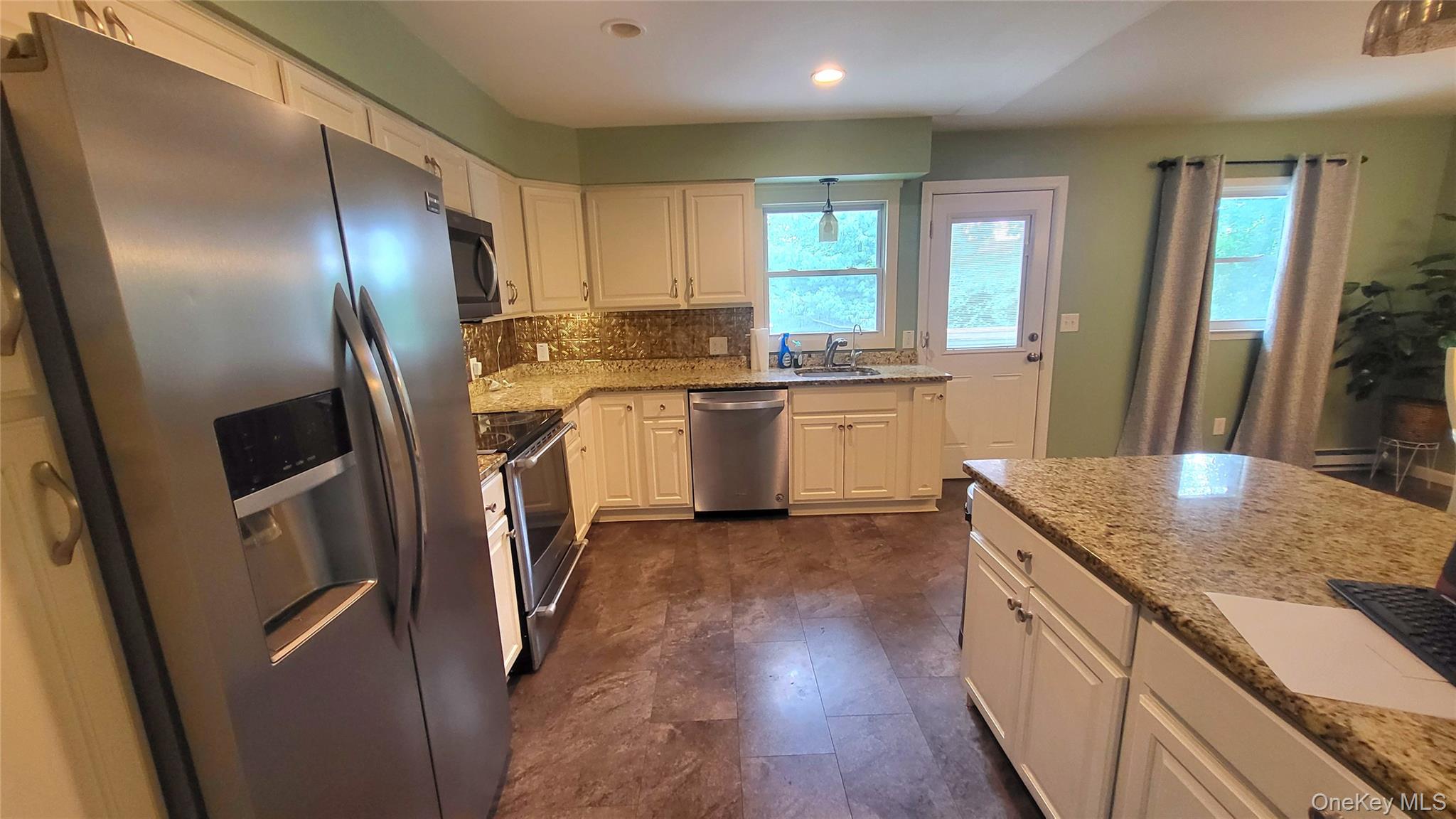 12 High Ridge Road Poughkeepsie, NY 12603 - Photo 6 of 34 Kitchen with tasteful backsplash
