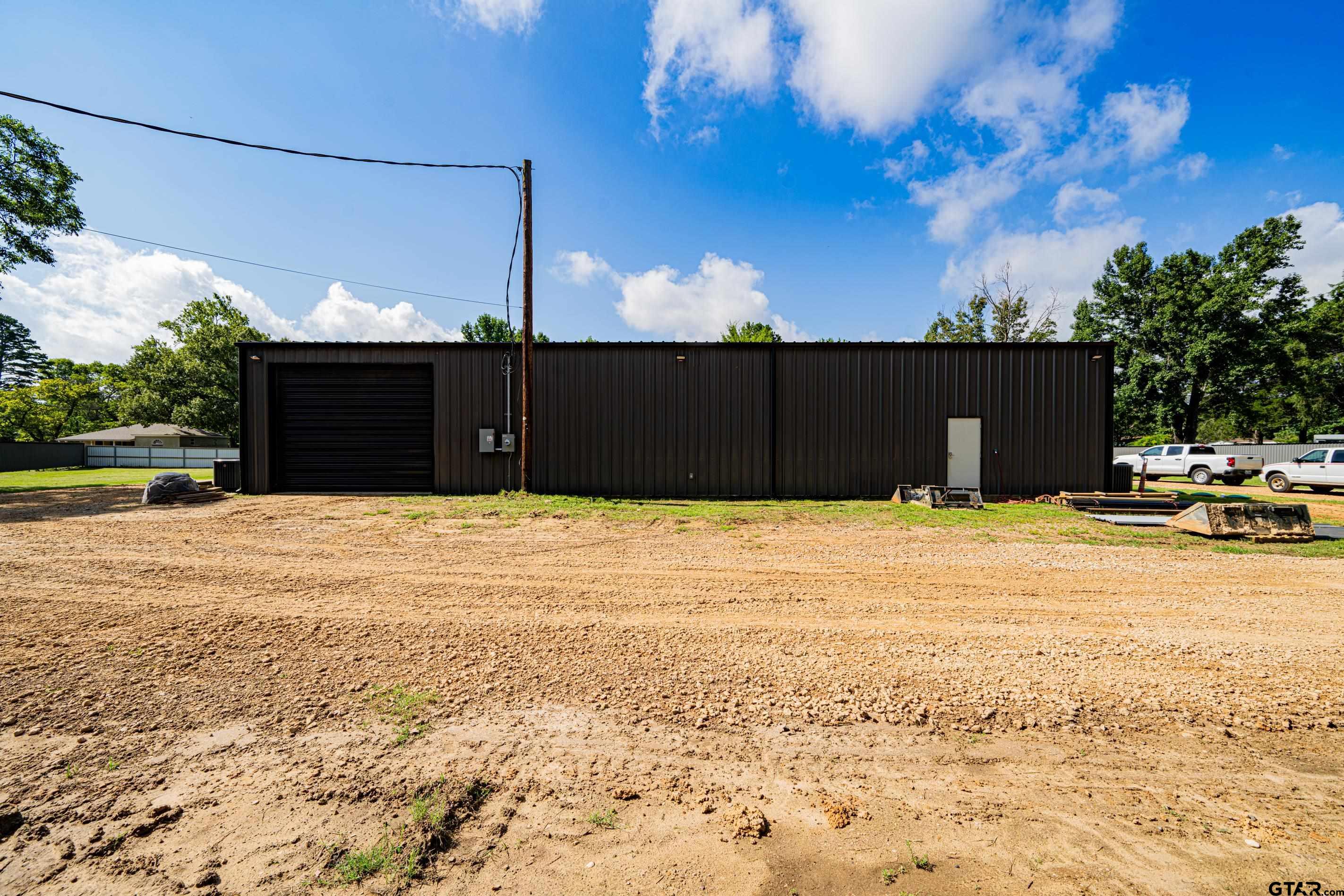 126 Gamel Road Longview, TX 75604 - Photo 20 of 23 a front view of a house with a yard