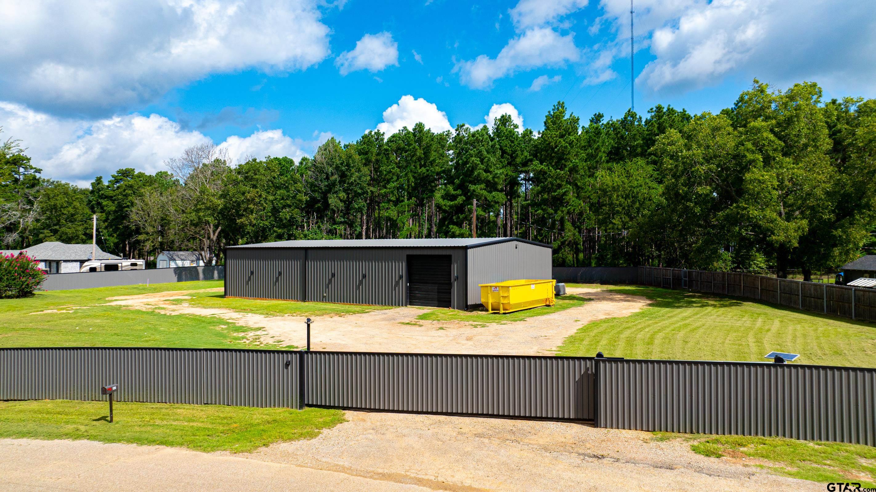 126 Gamel Road Longview, TX 75604 - Photo 2 of 23 a view of a swimming pool with an outdoor space and seating area