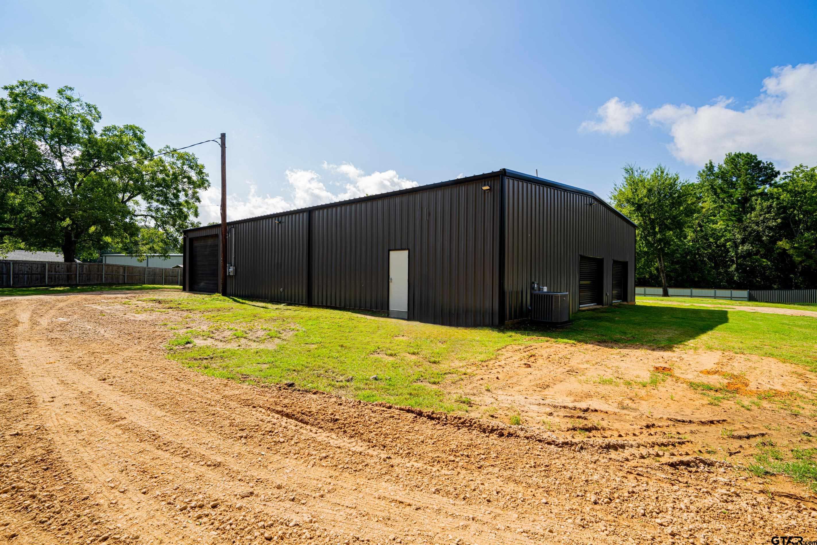 126 Gamel Road Longview, TX 75604 - Photo 21 of 23 a house with a yard