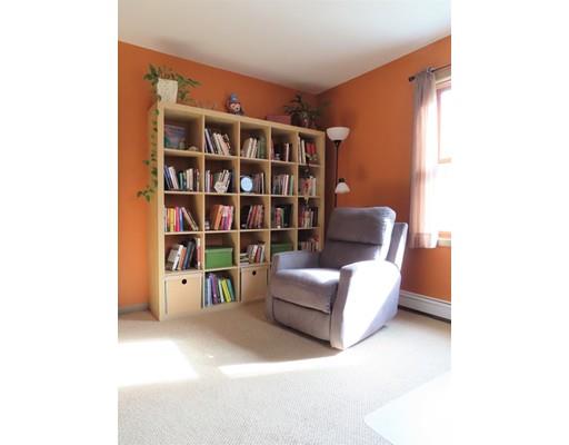 194 Root Road Barre, MA 01005 - Photo 11 of 25 a living room with furniture and a book shelf