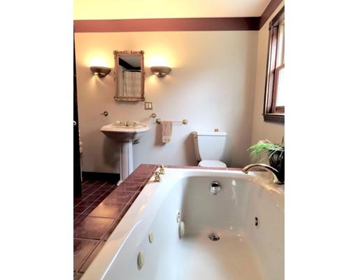 194 Root Road Barre, MA 01005 - Photo 16 of 25 a en suite bathroom with a sink and mirror