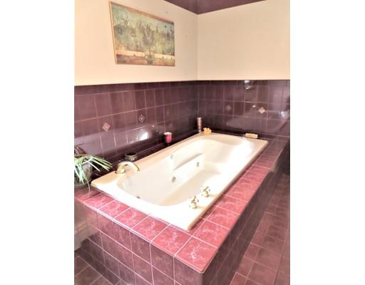 194 Root Road Barre, MA 01005 - Photo 17 of 25 a bathroom with a sink and a mirror