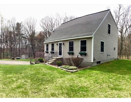 194 Root Road Barre, MA 01005 - Photo 2 of 25 a backyard of a house with yard table and chairs