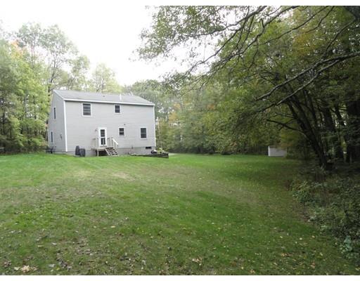 194 Root Road Barre, MA 01005 - Photo 23 of 25 a view of a backyard with large trees