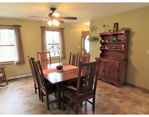 194 Root Road Barre, MA 01005 - Photo 7 of 25 a view of a dining room with furniture