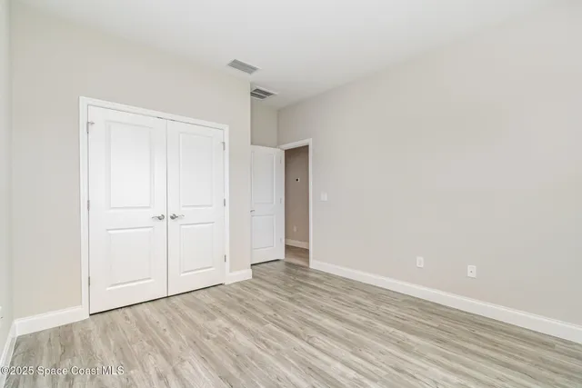 a bathroom with a granite countertop sink mirror and a