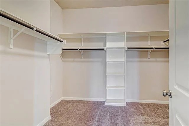 20008 Navarre Terrace Pflugerville, TX 78660 - Photo 13 of 18 a view of an empty walk in closet