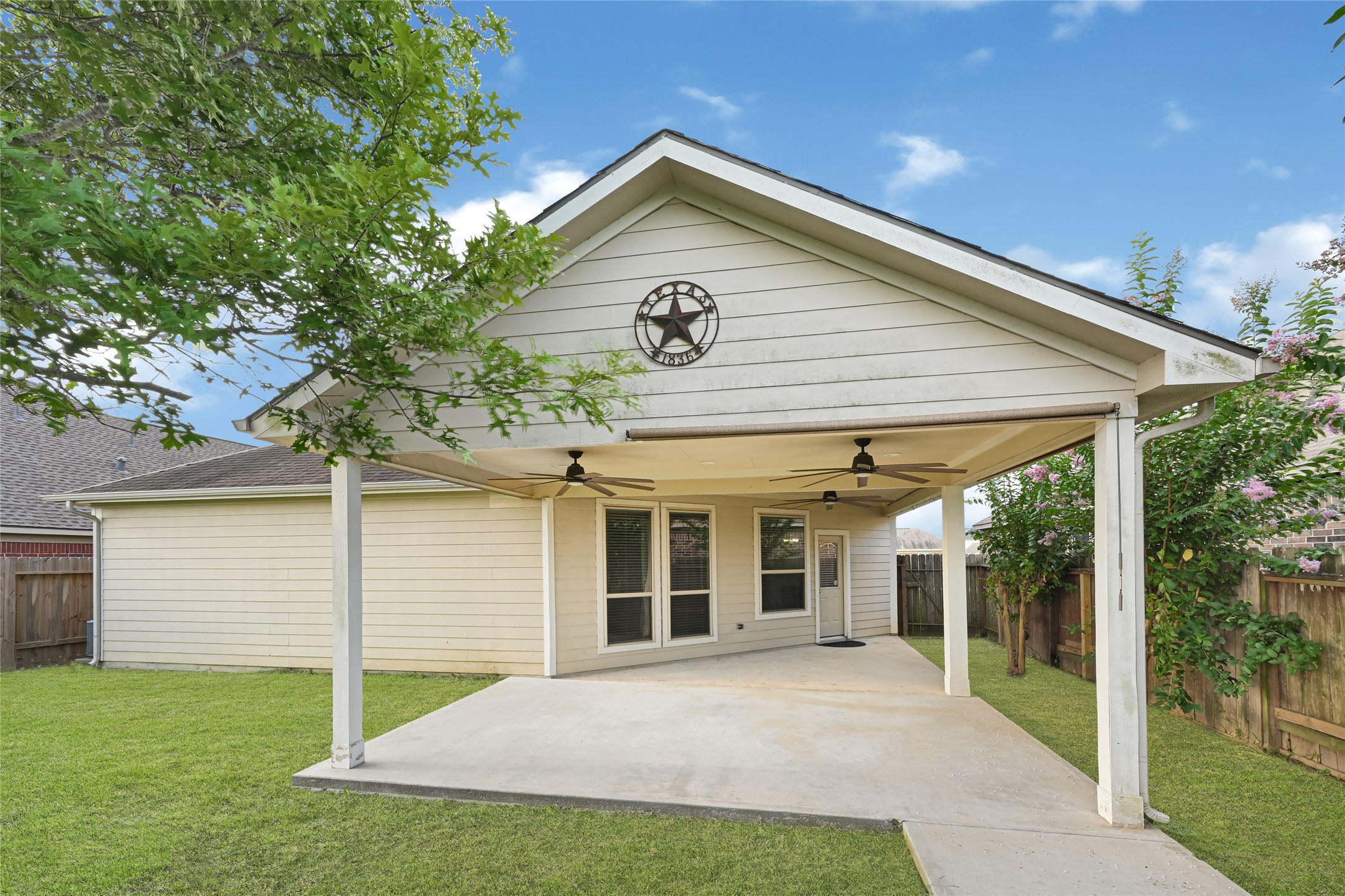 5331 Seabird Street Baytown, TX 77521 - Photo 37 of 38 a view of a house with backyard and garden