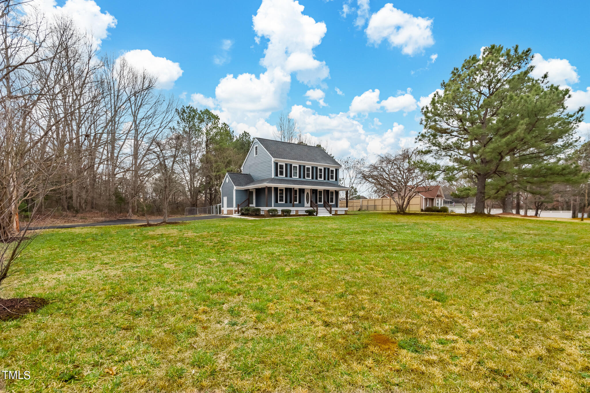 3012 Old Crews Road Raleigh, NC 27616 - Photo 2 of 34 a front view of a house with garden