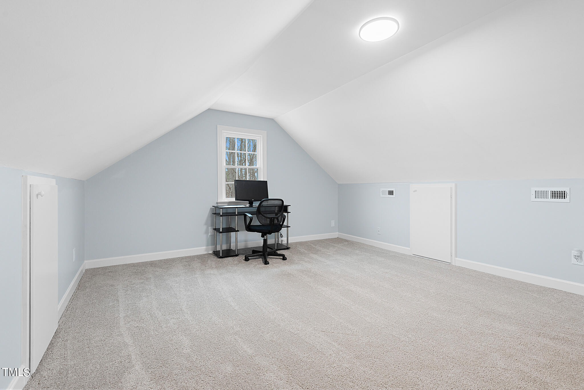 3012 Old Crews Road Raleigh, NC 27616 - Photo 27 of 34 a view of an empty room with a fireplace