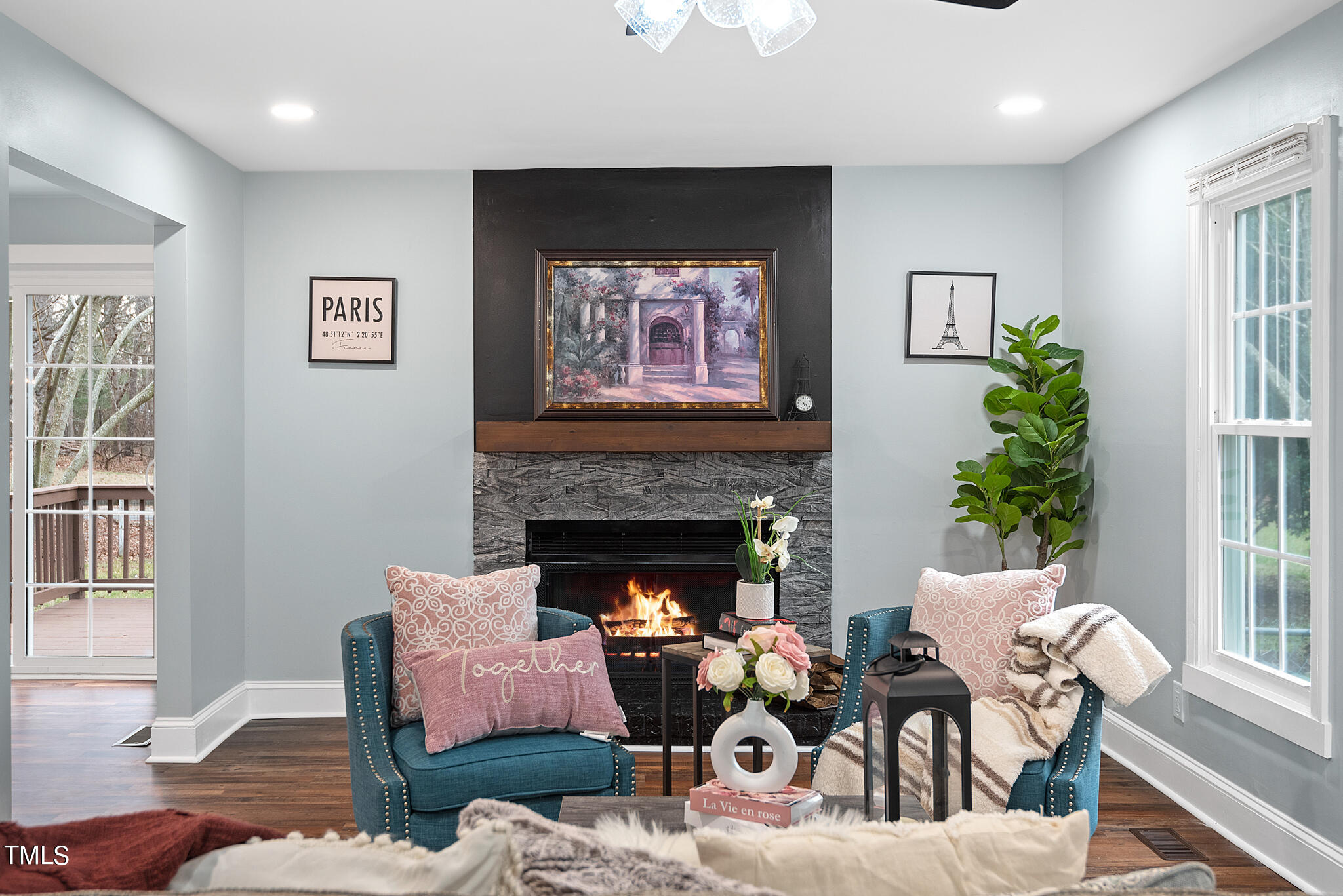 3012 Old Crews Road Raleigh, NC 27616 - Photo 4 of 34 a living room with furniture and a fireplace